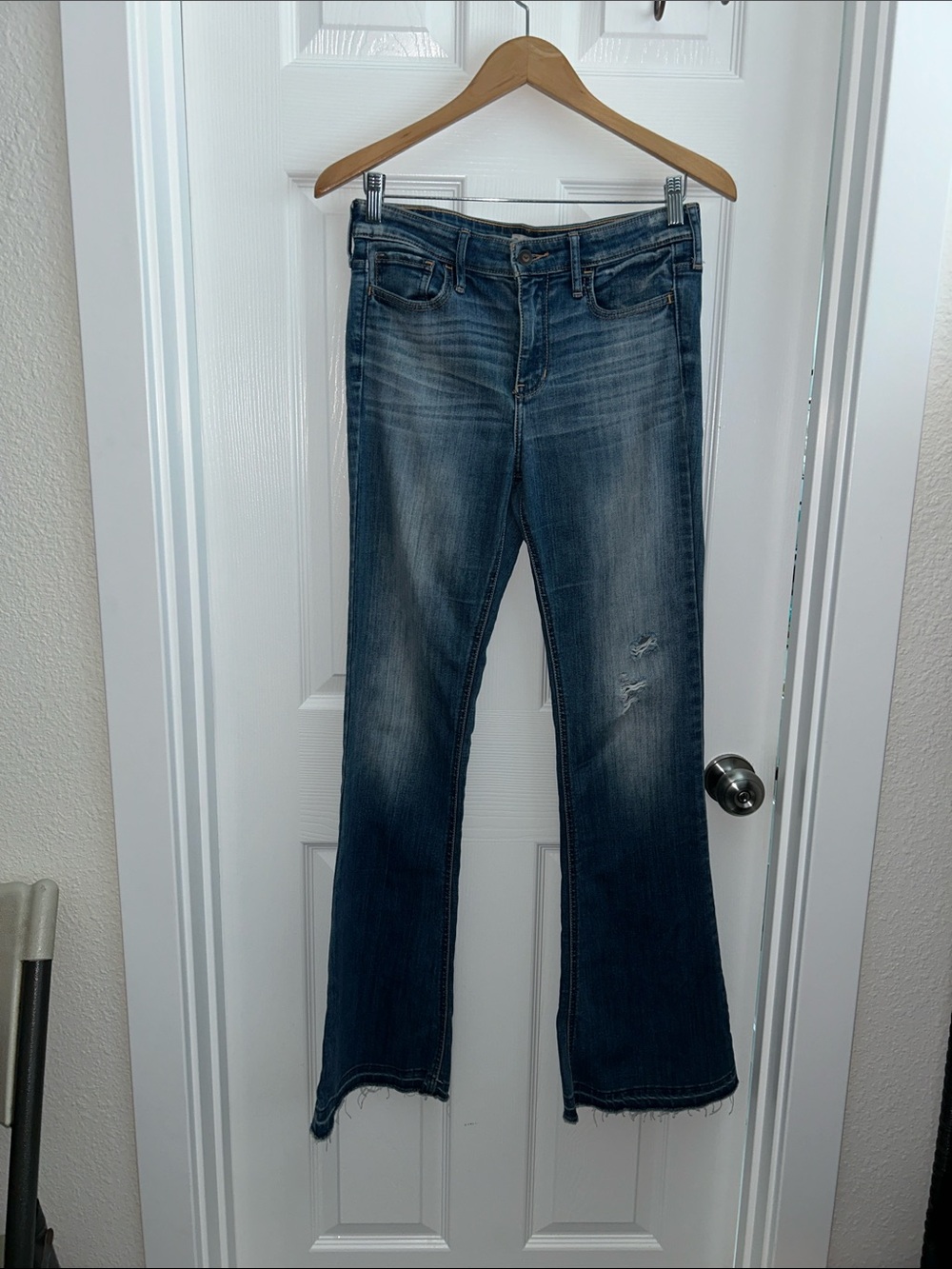 Hollister Faded Blue Bootcut Jeans with Light Distressing